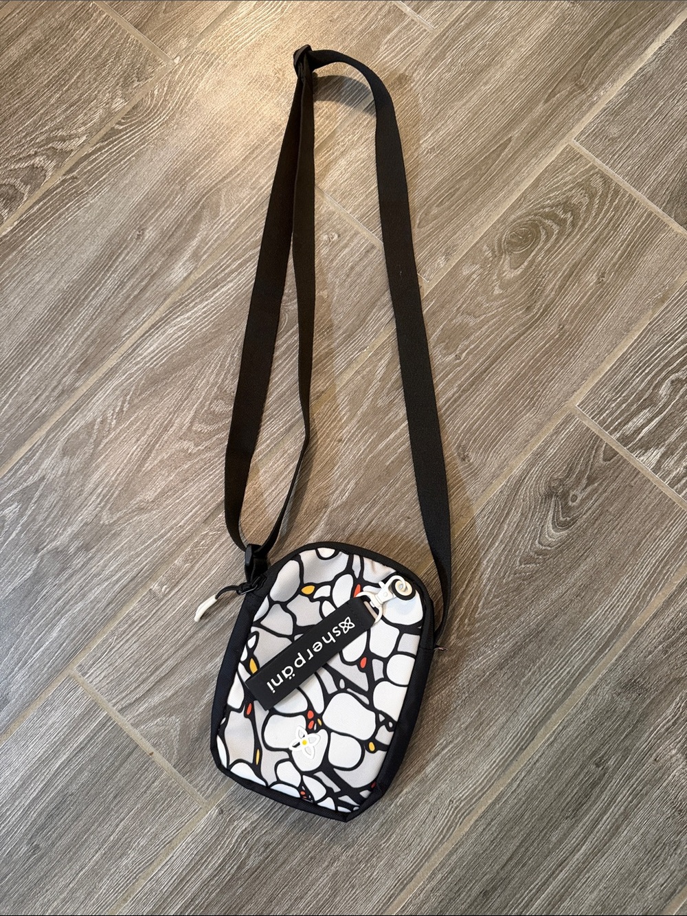 Sherpani Rogue mini crossbody bag Magnolia pattern EUC w/ RFID